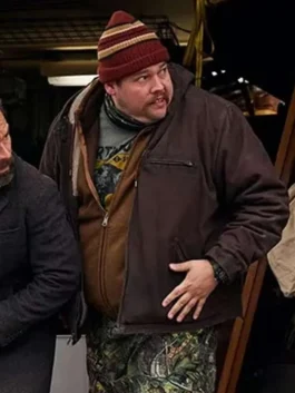 Remy Bouchard in a brown cotton hooded jacket with a functional design.