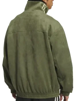 Side-rear view of the men's Lunar New Year 2026 Green Adidas Jacket with a suede texture. Features the ribbed hem and collar detail of the Adidas CNY 2026 Green Jacket.