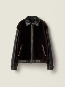 The Sydney Sweeney black leather with shearling blouson jacket features a sleek design; a premium leather jacket with shearling for women.