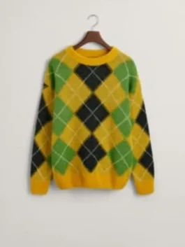 A yellow fuzzy argyle sweater displayed on a hanger against a plain background.