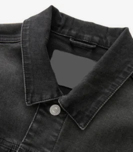 Close-up of the pointed collar on a black jeans black jacket, highlighting the authentic texture of this versatile black denim style jacket.