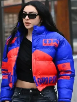 A full shot of the Charli XCX royal blue and red puffer jacket from Sundance 2026 at America Jackets.
