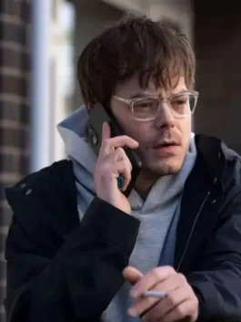 Charlie Heaton Industry Jacket featuring a premium charcoal wool finish and a high-status tailored silhouette for a sharp cinematic profile.