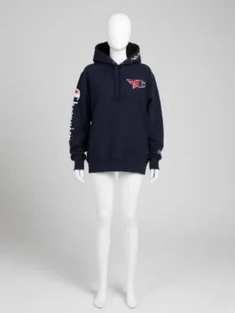 A full-size white mannequin wearing a faze champion hoodie in navy blue, showcasing the athletic fit, hood detail, and collaborative logos.