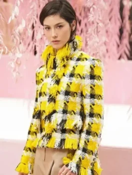 A detailed view of the Gracie Abrams Spring 2026 couture yellow jacket from America Jackets.