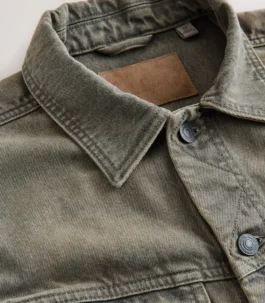 Close-up of the sturdy collar and branded tag on this Men Grey Denim Jacket, highlighting the high-quality stitching of this Grey denim style jacket.