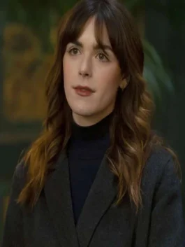 Kiernan Shipka Industry Coat featuring a premium black wool-blend finish and a high-status tailored silhouette for a sharp cinematic profile.