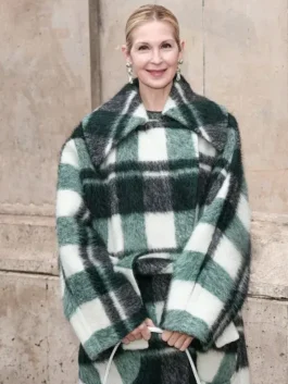 A front view of the beige wrap coat worn by Kelly Rutherford during Paris Fashion Week 2026 at America Jackets.