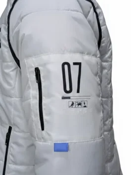 A stylish white puffer jacket on a hanger, highlighting its modern, sleek bomber-style silhouette.