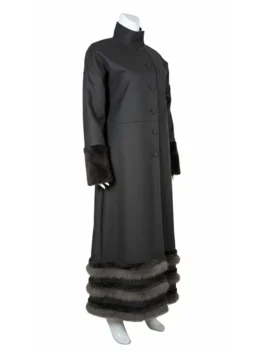 A full-length product image of the Rama Duwaji 2026 ceremonial long coat in dark brown.