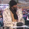 Randy Moss wears a spotted fur coat during the Patriots vs Texans broadcast, featuring the Randy Moss Patriots Texans fur coat style.