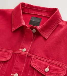 Sharp close-up of the collar and neckline on a men red denim jacket, showcasing the classic construction of this trendy denim jacket red.