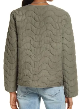 Back view of an olive green quilted jacket womens style featuring a wavy stitched pattern, crew neck design, and comfortable quilted cotton blend.