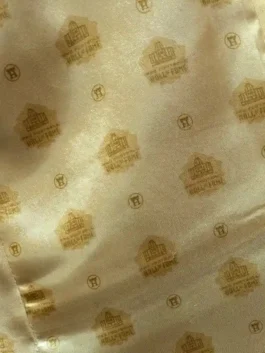 Men's gold pro football celebratory blazer with chest patch.