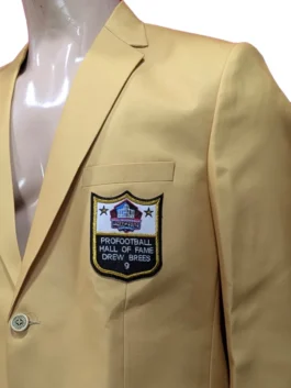 Tailored gold blazer with two-button closure and lapel collar.