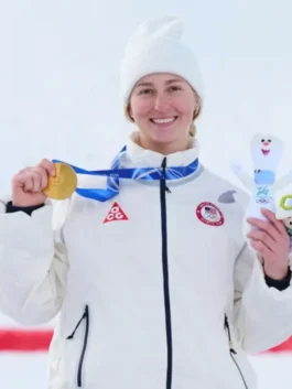 Close up of Elizabeth Lemley Winter Olympics 2026 Team USA Quilted Jacket featuring the ACG logo and Olympic team patch with a gold medal.