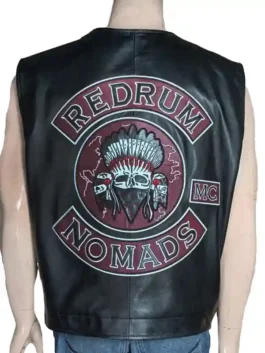 A professional display of a leather biker vest featuring 