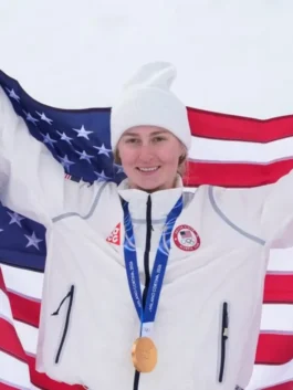 Gold medalist Elizabeth Lemley holding an American flag wearing the official Winter Olympics 2026 Team USA Elizabeth Lemley jacket.