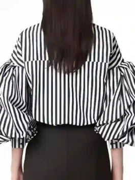 Emily In Paris S5 Lily Collins Striped Puff Sleeve Shirt back view showing the expert tailoring and seamless striped pattern.