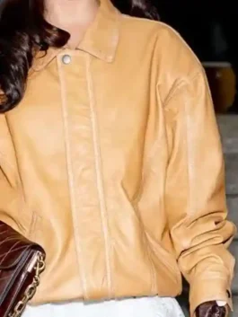 NYFW 2026 Emilia Mernes Brown Leather Jacket front view showcasing the zipper and buttoned closure.