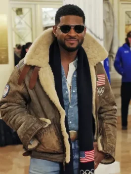 Olympics 2026 Usher Shearling Leather Jacket worn as a complete outfit with denim jeans and a dark scarf.