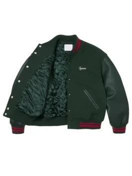Supreme Cross Varsity Jacket shown in a high quality finish that highlights the expert tailoring and 2026 trends.