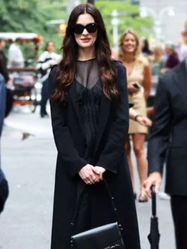 The Devil Wears Prada 2 Andy Sachs Black Coat featuring a sleek tailored silhouette and a high end dark finish.