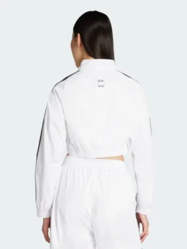 Womens Cropped Track Jacket back view showing the seamless white paneling and elegant high fashion garment flow.