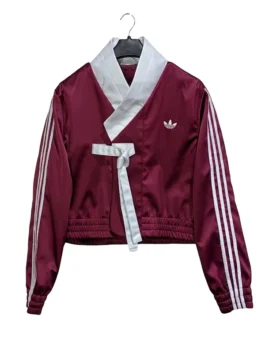 Women's maroon wrap-style fusion jacket with white sleeve stripes.