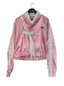 Women's pink wrap-style Hanbok fusion jacket with white stripes.