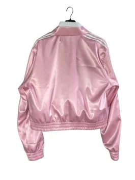 Modern pink athletic jacket featuring a traditional tie-front closure.