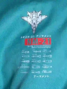 M.RAGE Arsenal jacket in forest green with techwear-inspired sleeve graphics and black zipper details.