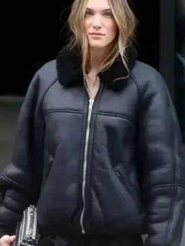 Charlotte Cardin Oversized Leather Jacket showcasing professional shearling lining and luxury rib knitted cuffs.