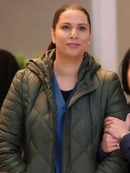 Lorena Diaz Green Quilted Jacket showcasing professional side pockets and a luxury hooded drape.