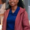 Chicago Med S11 Tamika Jenkins Quilted Jacket showcasing professional pockets and a luxury hooded drape.