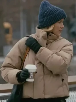 Jessy Schram Chicago Med S10 Puffer Jacket in a professional beige finish with a sturdy zipper and luxury feel.