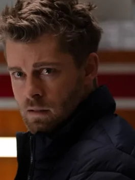 Luke Mitchell Chicago Med S10 Puffer Jacket in professional black parachute fabric with a luxury stand up collar.