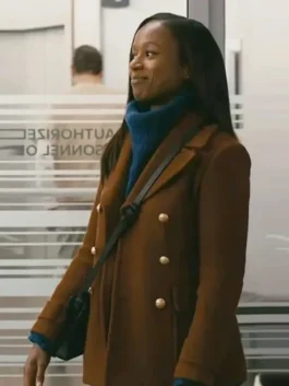 Naomi Howard Chicago Med S10 Brown Peacoat showcasing professional full length sleeves and a luxury brown drape.