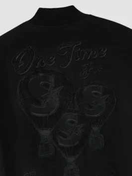 Scarborough Shooting Stars Championship Varsity Jacket closeup featuring professional embroidery and luxury lining.