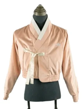Front view of a K-pop inspired fusion jacket with a minimalist body and decorative sleeves.