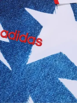 Adidas X Bape LS Star Jersey in striking blue cotton fleece with bold white stars, a shirt style collar and a clean relaxed pullover everyday fit.