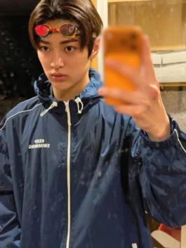 Keep Swimming BTS Jacket hooded edition in deep blue nylon with drawstring collar, white accents and a relaxed everyday zip-up athletic fit.