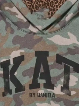 Gap Katseye Daniela Hoodie in camo colorway with luxury rib knitted hem and soft lining.