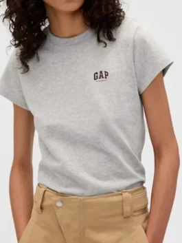 Gap x Victoria Beckham Logo T Shirt in soft fabric with a bold logo print, round neck collar and a relaxed half sleeve pullover fit in white and grey.