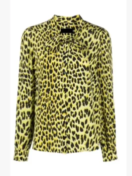 High Potential S02 Morgan Gillory Leopard Shirt front view in yellow leopard print cotton with a playful bow tie collar and bold design.
