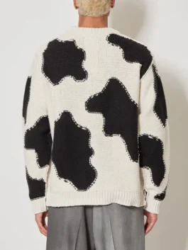 Saturday Night Live UK S01 Kasabian Cow Cardigan back view in bold black and white cow knit with a clean structured silhouette and rib knitted hem.