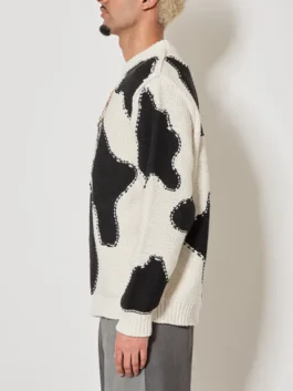 Saturday Night Live UK S01 Kasabian Cow Cardigan in bold black and white with a fun cow knit pattern and Kasabian's fearless SNL UK stage energy.