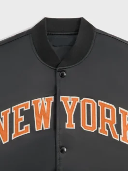 New York Knicks Playoffs Satin Bomber Jacket in professional black satin with luxury rib knitted collar design.