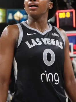 Las Vegas Aces Jackie Young Black Jersey featuring professional fabric panels and luxury pullover closure.