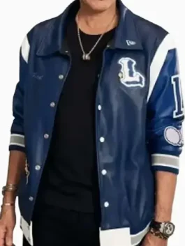 American Idol Lionel Richie Blue Varsity Jacket crafted in bold blue leather with rib knitted hem, cuffs and a relaxed confident varsity fit.